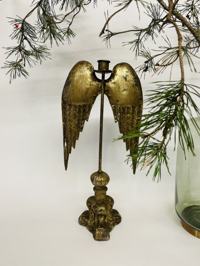 Kerzenständer mit goldenen Flügeln hängend auf barockem Sockel 